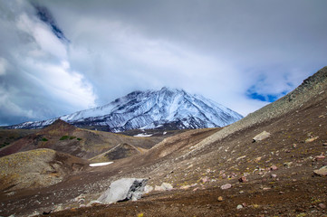 Mountain landscape: view on active Koryaksky Volcano on a sunny day. Koryaksky-Avachinsky Group of Volcanoes, Kamchatka Peninsula, Russia, Far East