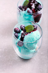 Fototapeta na wymiar Blue ice cream scoops served