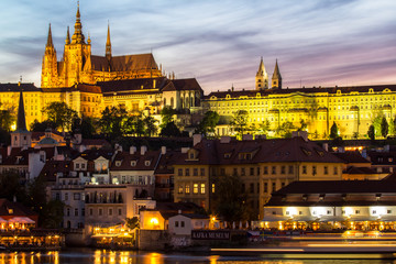 Naklejka na ściany i meble Castle and St. Vitus cathedral in Prague at night, Czech Republic