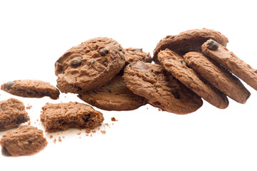 several pieces of cooky in strange pile on white background