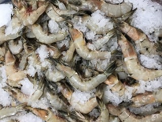Fresh shrimps on ice in a supermarket.