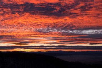 Pink glowing sunset sky over the mountain, Kopitoto Hill, Vitosha Mountain, Sofia, Bulgaria