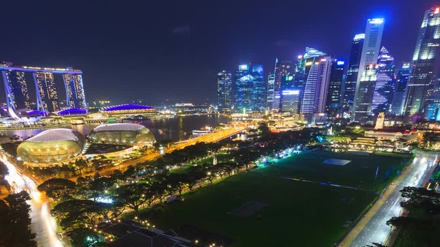 Beautiful Aerial Night Cityscape Of Singapore 4K Time Lapse (pan shot)