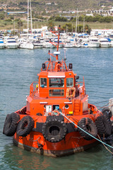 Red towing ship