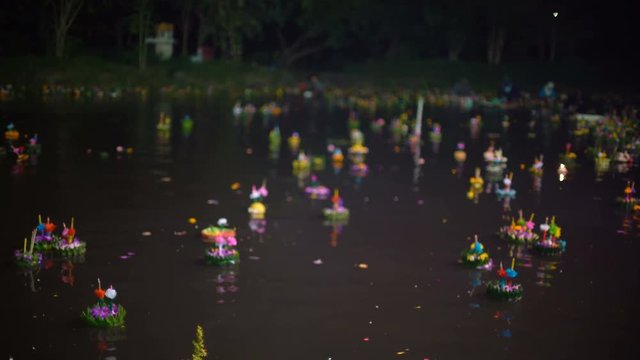 Floating krathongs at religious holiday Loy Krathong in Thailand 4k UHD (3840x2160)
