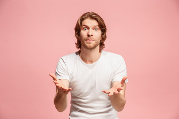 Beautiful male half-length portrait isolated on pink