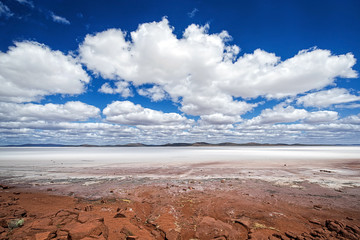 South Australia – Outback desert with dry Salt Lake Eyre under cloudy sky as panorama