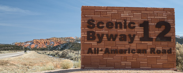 Photograph of signage for Scenic Byway Route 12 in the Utah desert.