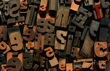 Jumbled letters and numbers, wooden letterpress