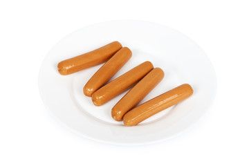 Meat sausage for hot dog or barbecue on plate. Isolated on white background. Fast food meal