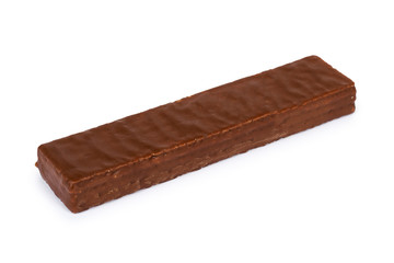 Delicious chocolate bar with wafer in hand. Isolated on white background. Milky waffle, crispy and sweet snack