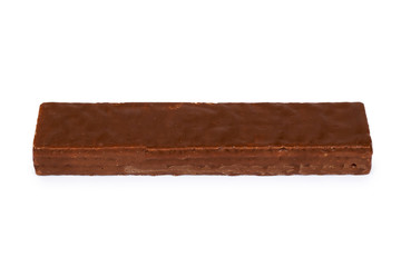 Delicious chocolate bar with wafer in hand. Isolated on white background. Milky waffle, crispy and sweet snack