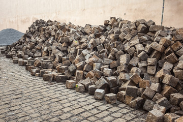 Heaps of cobblestones, pavement construction, Prague.