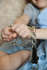 The concept of abuse and gaslighting in the family, the child is handcuffed. Loneliness, suppression, conflict between children and parents