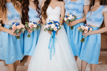 Beautiful Bridesmaids in a Turquoise Dresses and Bride Holding wedding bouquets. Artwork.