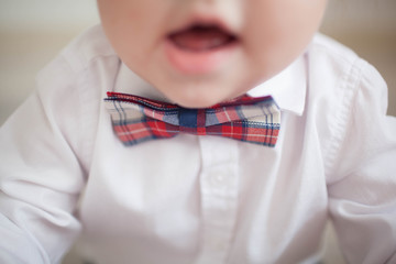 Paper bow ties on wooden background. Father's day concept