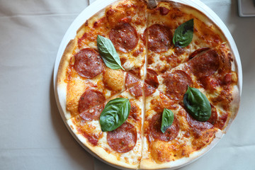Hot Pepperoni Pizza in dish , Italian food