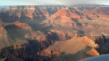 Grand Canyon Sunrise/Sunset, with Shadowing Effects in Warm Earth Tones; USA Travel, National Parks Tours, Natural Beauty