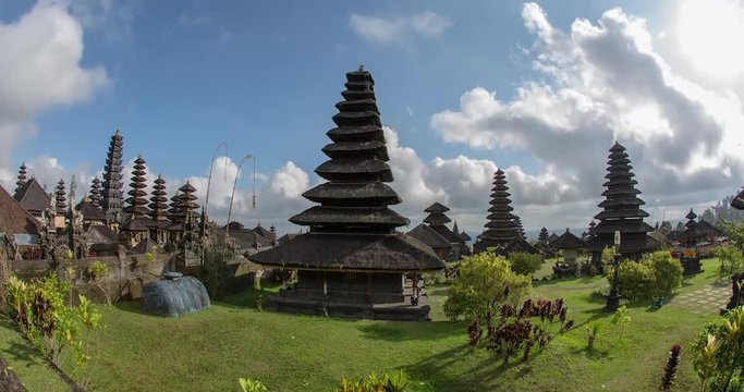 timelapse of temple Pura Besakihin bali with clouds passing by on a sunny day