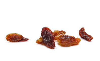 Pile raisins isolated on white background
