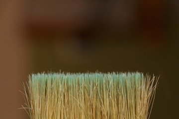 The bristles of the brush close-up on blurred background