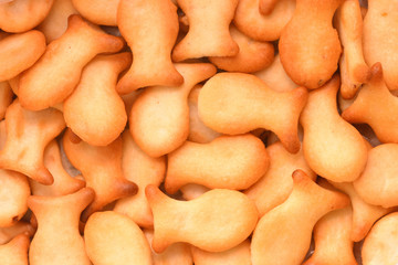 Cookies in the form of fish with the smell of onions, salted