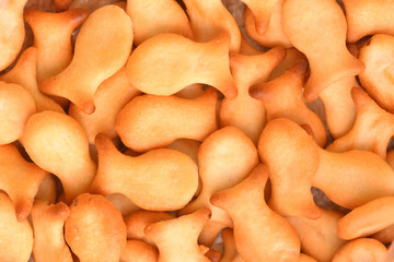 Cookies in the form of fish with the smell of onions, salted