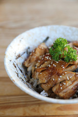 japanese food , Chicken teriyaki with rice on wood background