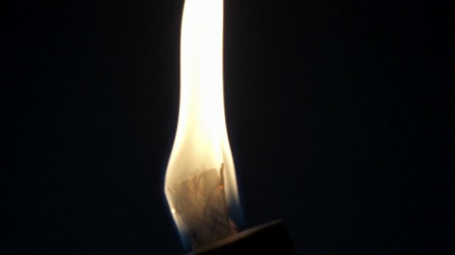 Flame of a torch in slow motion 240fps. Passion style footage of Easter scenes