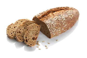a loaf of unleavened bread with sunflower seeds close-up on a white background, isolate