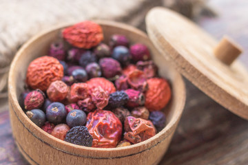 Blueberry, dog rose, mountain ash and juniper in one bowl