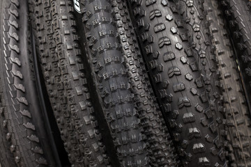 Modern mountain bike tire. Element of bicycle. Large selection of tires with a different tread