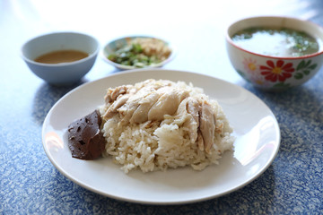 Hainanese chicken rice with cucumber in closeup , Thai food