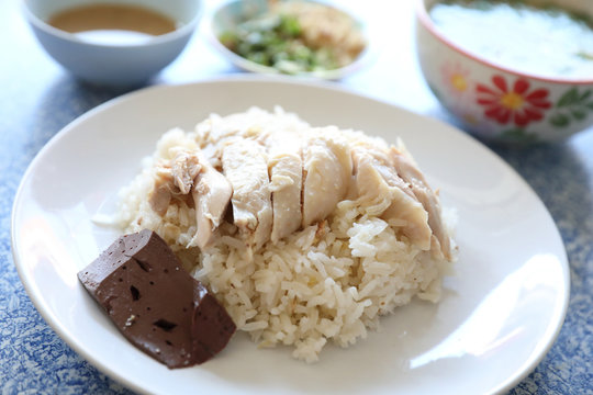 Hainanese chicken rice with cucumber in closeup , Thai food