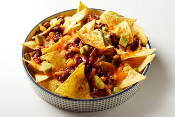 Mexican chili con carne with nachos and cheese