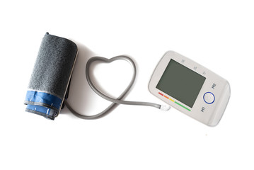 Blood pressure gauge with cuff and monitor connected with a tube in heart shape, device for health and medicine