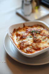 Homemade Beef Meat lasagna on dish in restaurant , Italian food