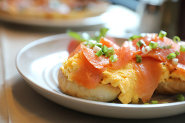 Scrambled eggs with smoked salmon on toast , Breakfast food