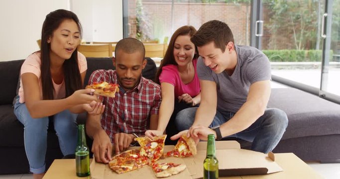 4K Happy Friends Hanging Out At Home Enjoying Beers & Takeout Pizza