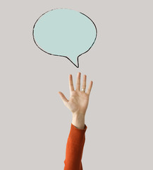 Hand raised with speech bubble