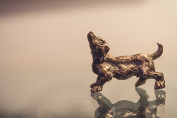 Obraz premium Miniature Silver Dog Figure