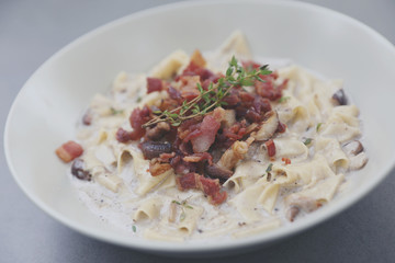 pasta fettuccine alfredo white sauce with ham bacon and mushroom