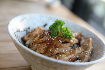 japanese food , Chicken teriyaki with rice on wood background