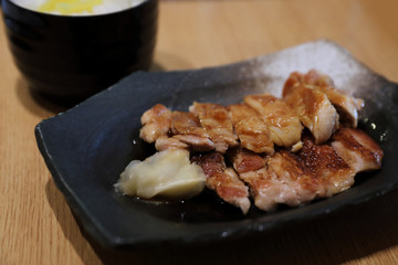 japanese food , Chicken teriyaki with rice on wood background