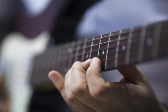 Finger On Guitar