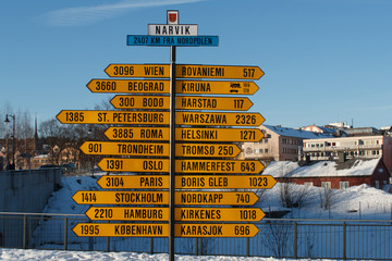 Yelllow signpost in Narvik, Norway © Sebastian Ga