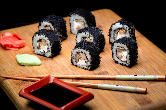 Sushi zuko maki with shrimp, cheese, cucumber and black masago caviar.