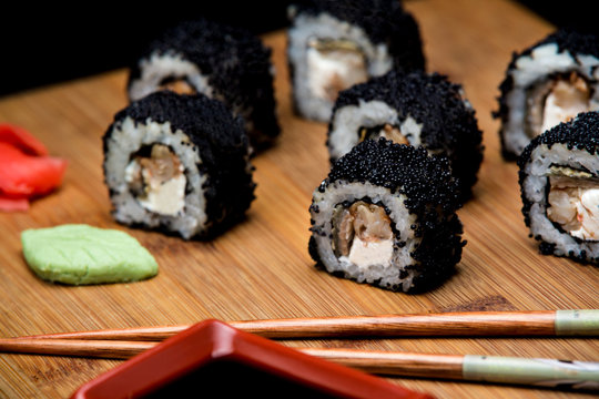 Sushi zuko maki with shrimp, cheese, cucumber and black masago caviar.