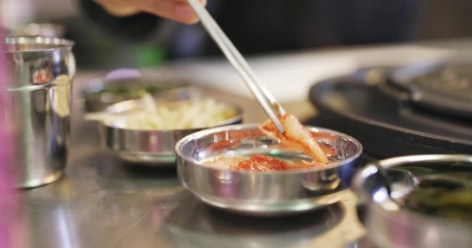 Picking kimchi in korean restaurant