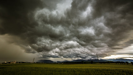 Fototapeta na wymiar storm over the fields
